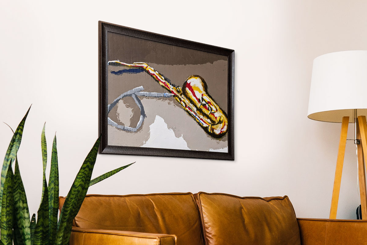 Saxophone painting on cardboard above sofa